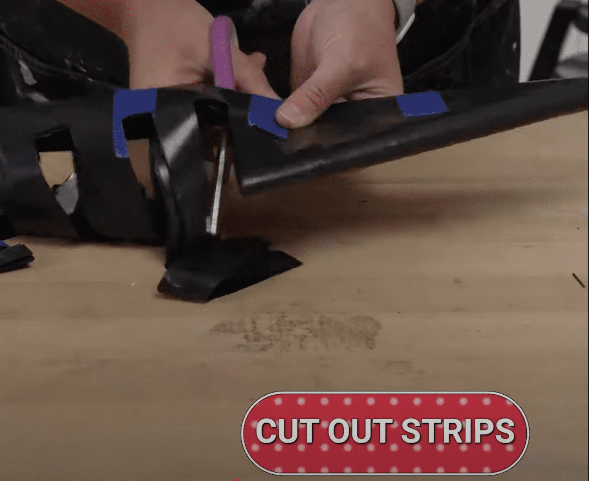 Cut folded trash bag in strips