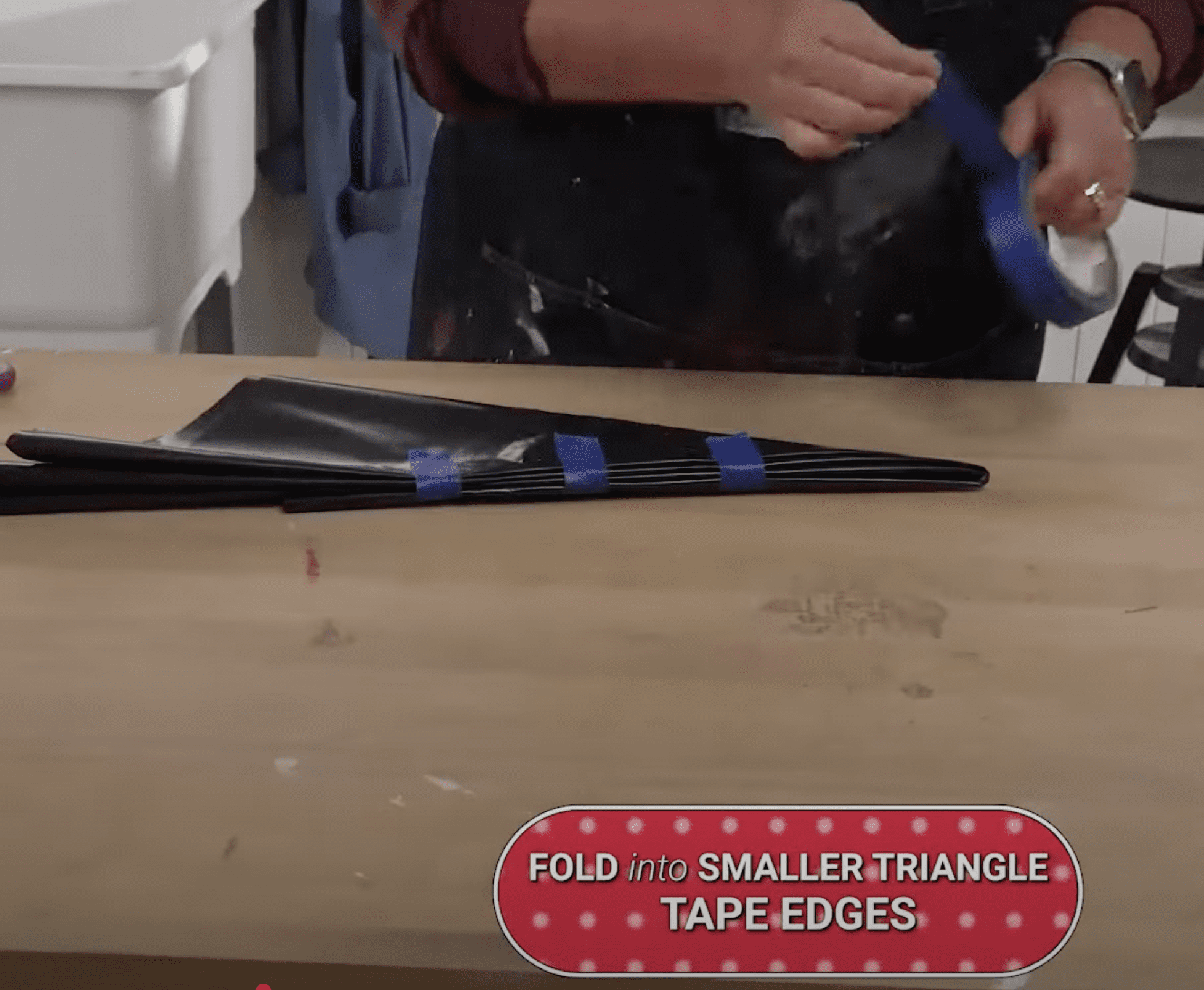 Folding trash bag into a small triangle