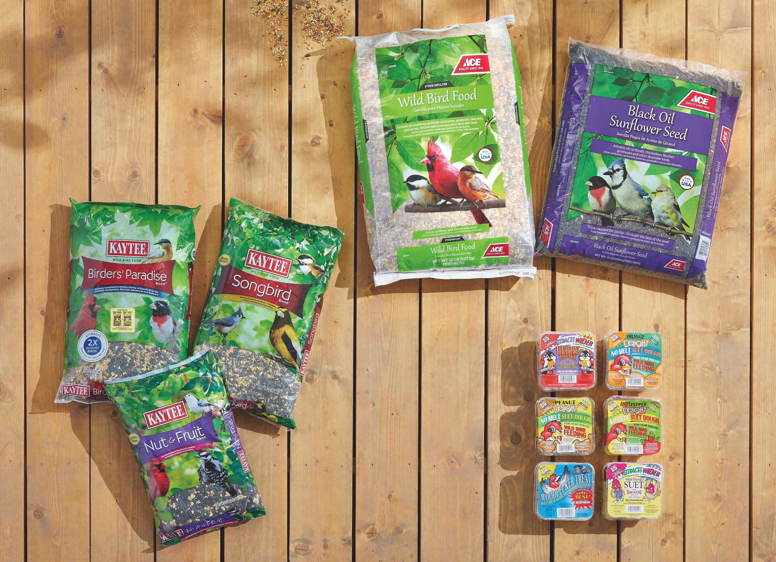 Bird food bags on wood background.