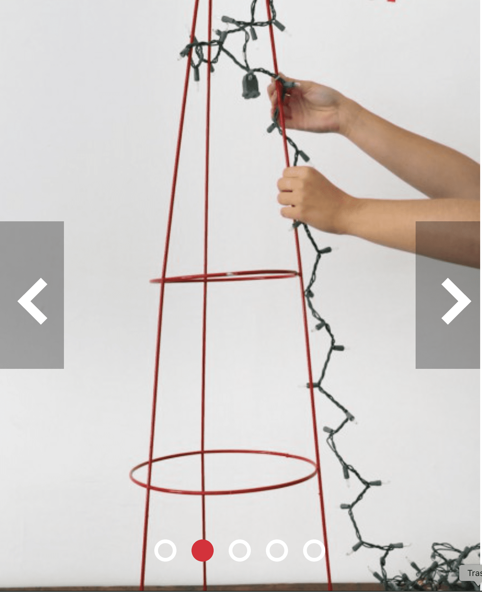 Wrap holiday lights around the tomato cage