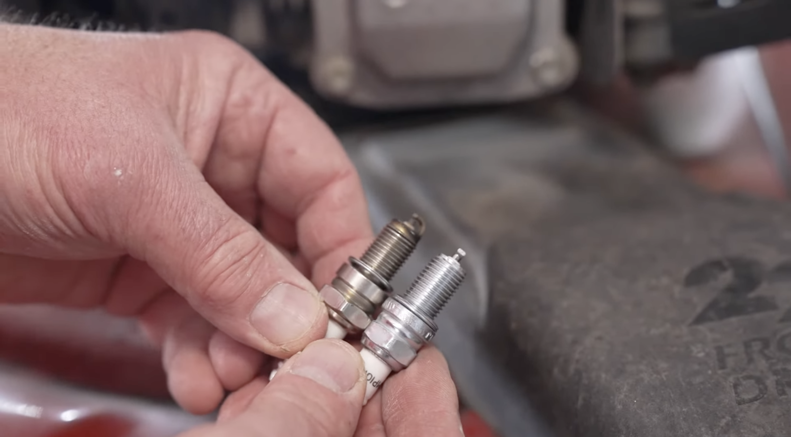 old and new spark plug