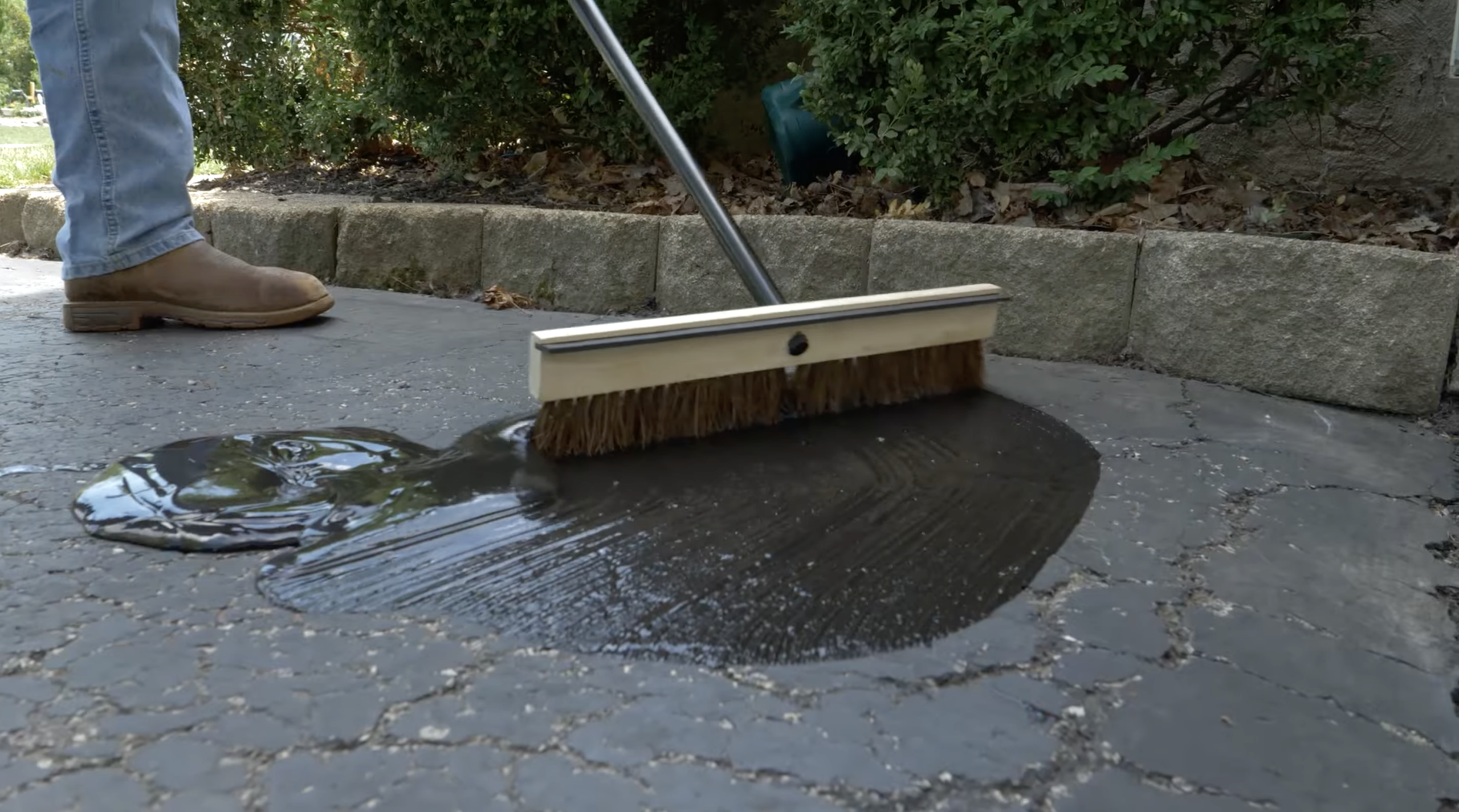 Use a brush to spread sealer.