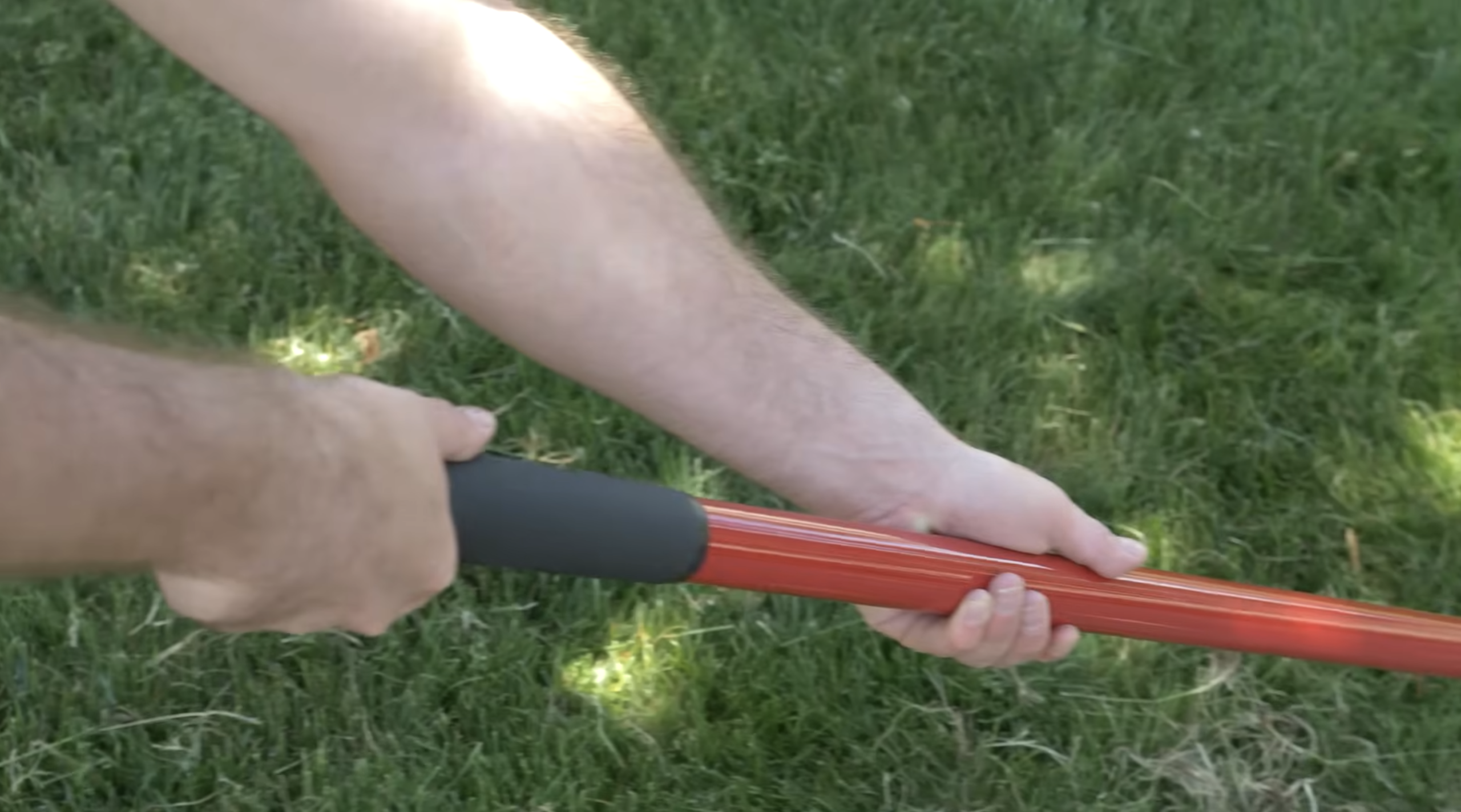 Two hands on handle