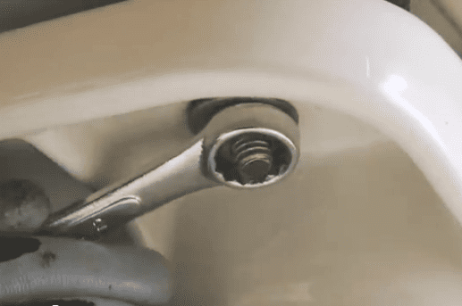 Loosen tank nuts